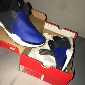 Blue and black Nike Sock Darts worn once